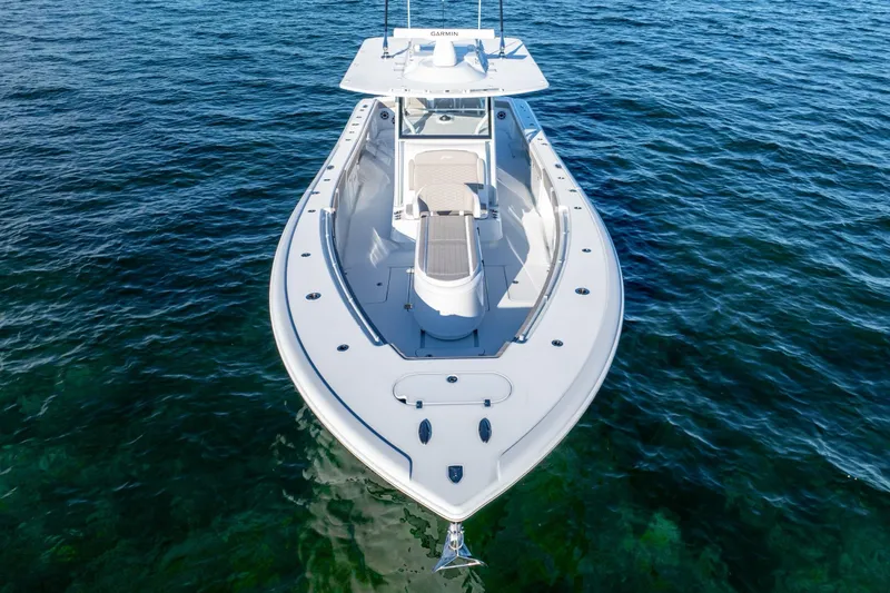  Yacht Photos Pics 2024 Yellowfin 39 boat on clear blue water, aerial view.
