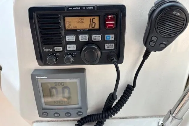 Stormer Yacht Photos Pics VHF marine radio and speed display on 2005 Silverton 34 Convertible boat.