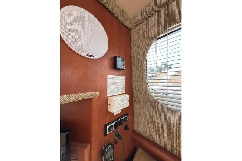 Stormer Yacht Photos Pics Interior of 2005 Silverton 34 Convertible yacht with speaker and control panel.