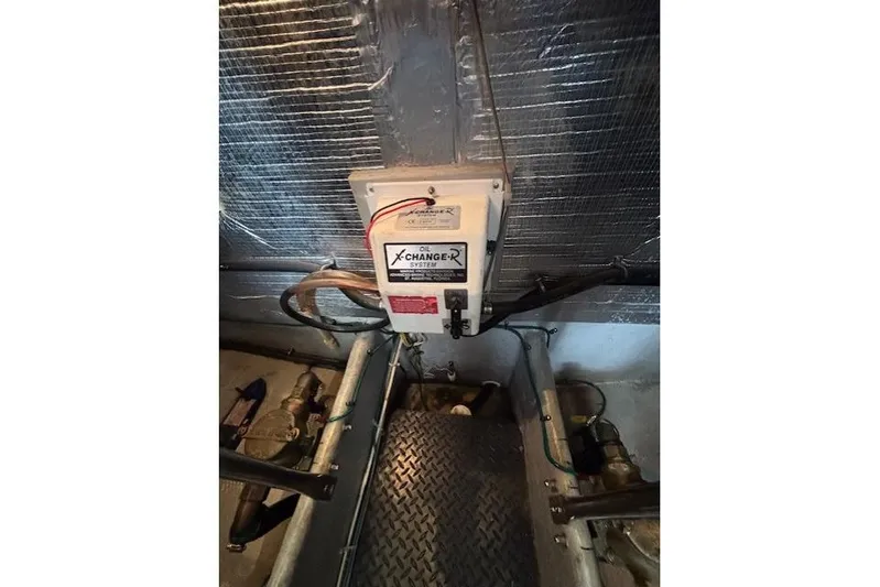 Stormer Yacht Photos Pics Engine room of 2005 Silverton 34 Convertible with oil change system installed.