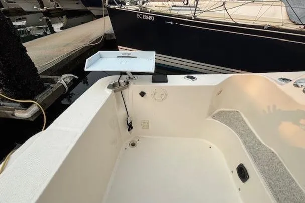 Stormer Yacht Photos Pics 2005 Silverton 34 Convertible boat interior with fishing station at dock.