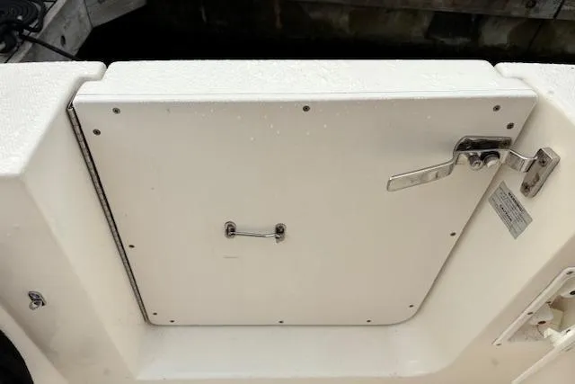 Stormer Yacht Photos Pics Hatch door on a 2005 Silverton 34 Convertible boat, featuring a metal latch.
