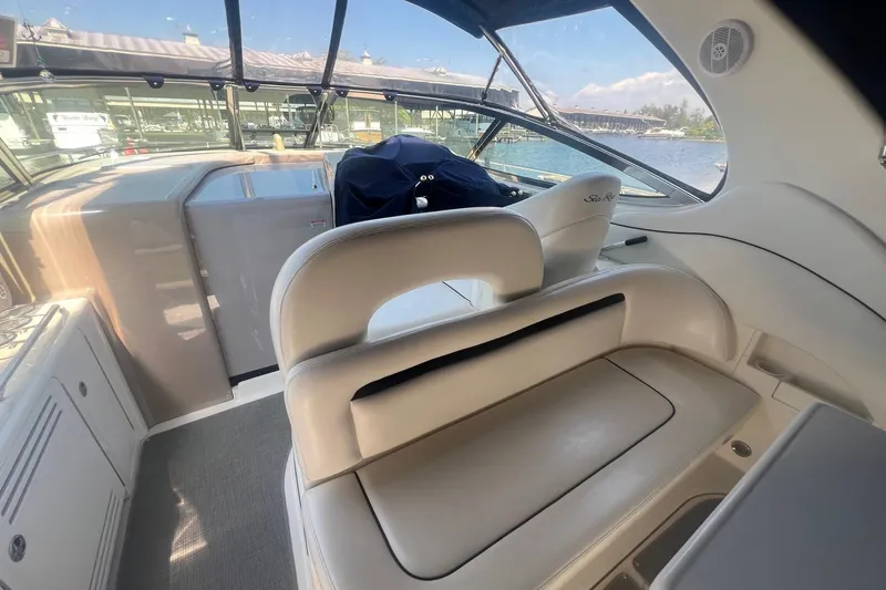  Yacht Photos Pics Interior of a 2005 Sea Ray 360 Sundancer boat with seating and helm.