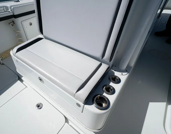  Yacht Photos Pics 2018 Yellowfin 32 Offshore boat seat with cup holders.