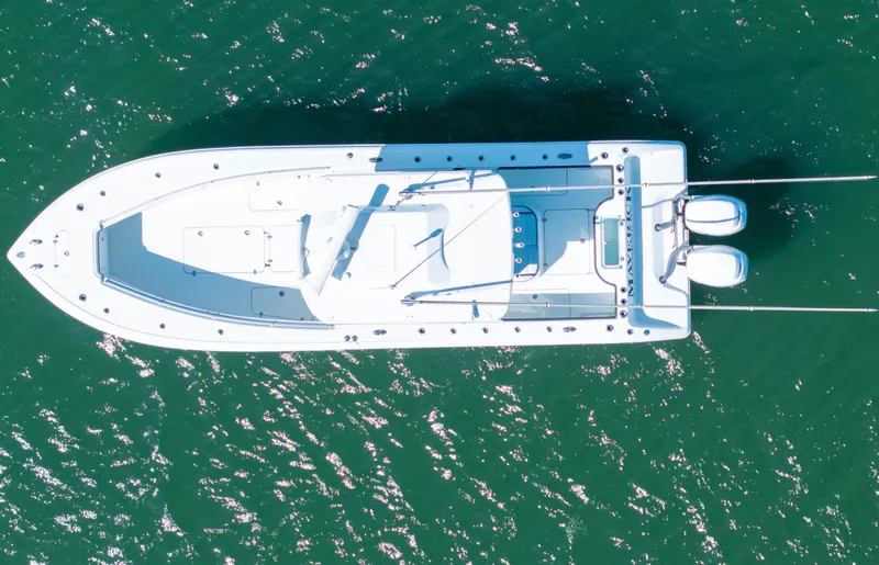  Yacht Photos Pics Aerial view of 2018 Yellowfin 32 Offshore boat on green water.