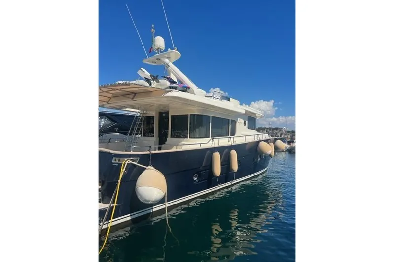  Yacht Photos Pics 2008 Apreamare Maestro 65 yacht docked in sunny marina.