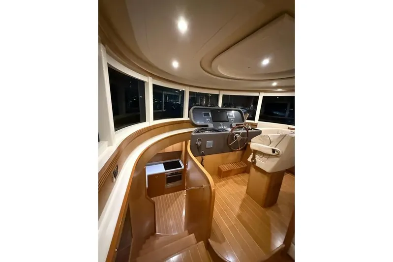  Yacht Photos Pics Luxurious interior of 2008 Apreamare Maestro 65 yacht with modern helm station.