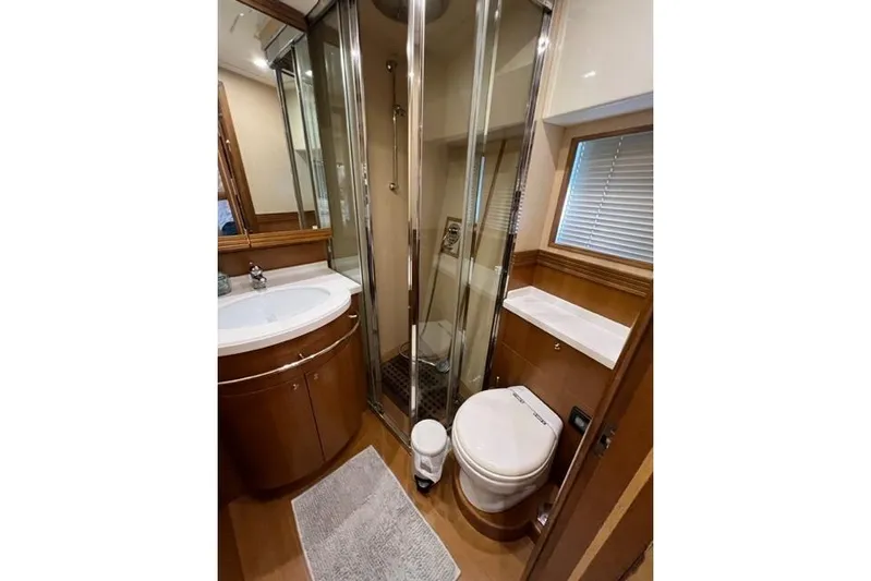  Yacht Photos Pics Luxurious bathroom in 2008 Apreamare Maestro 65 yacht with shower and modern fixtures.