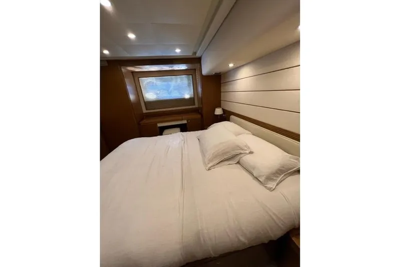  Yacht Photos Pics Luxurious bedroom interior of 2008 Apreamare Maestro 65 yacht with cozy bedding.