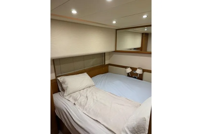  Yacht Photos Pics Luxurious bedroom interior of 2008 Apreamare Maestro 65 yacht with cozy bedding.