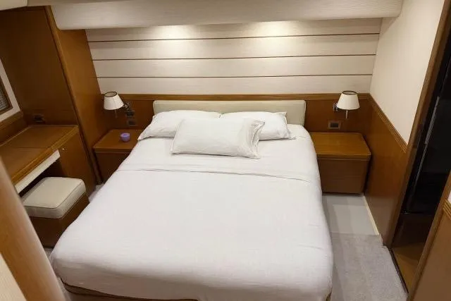  Yacht Photos Pics Luxurious bedroom interior of 2008 Apreamare Maestro 65 yacht with modern furnishings.