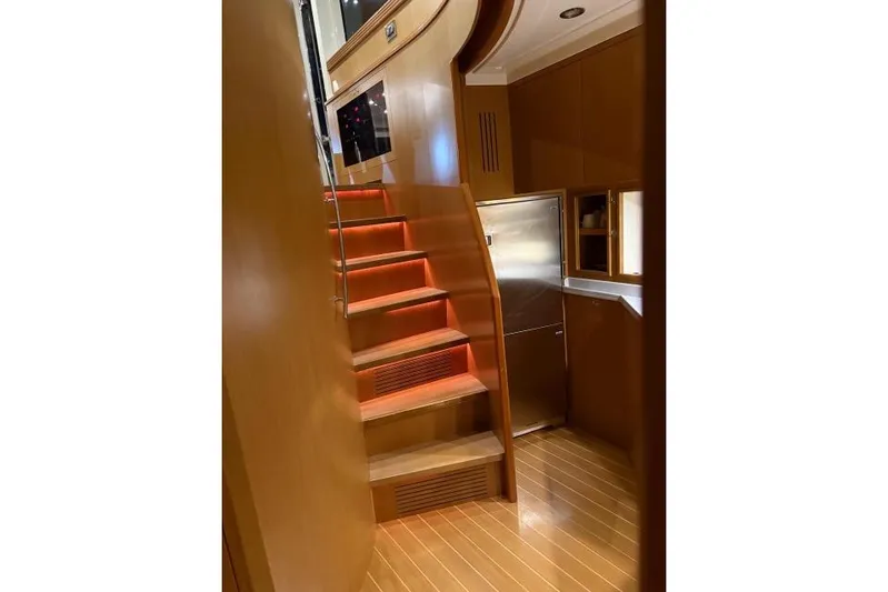  Yacht Photos Pics Interior of 2008 Apreamare Maestro 65 yacht with wooden stairs and modern design.
