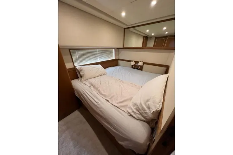  Yacht Photos Pics Luxurious bedroom interior of 2008 Apreamare Maestro 65 yacht with cozy bedding.