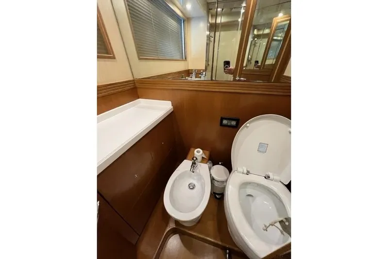  Yacht Photos Pics Bathroom interior of 2008 Apreamare Maestro 65 yacht, featuring toilet and bidet.