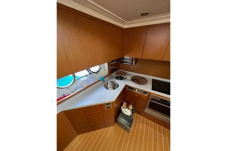  Yacht Photos Pics Luxurious kitchen interior of 2008 Apreamare Maestro 65 yacht with modern amenities.