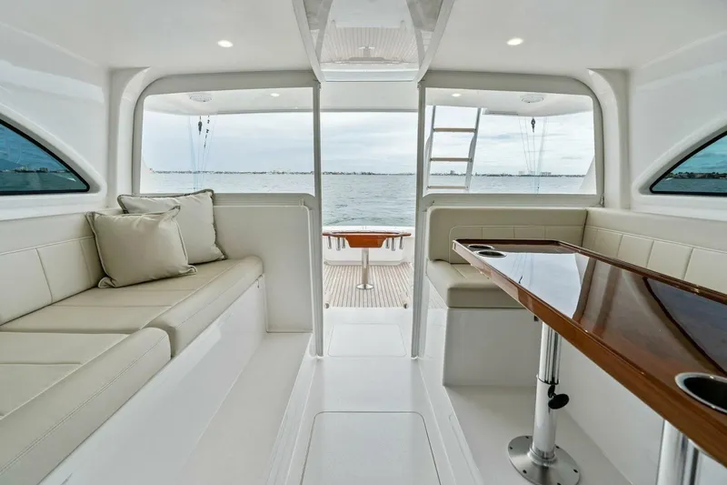 Damfino Yacht Photos Pics Luxurious interior of 2021 Viking 46 Billfish yacht with ocean view.