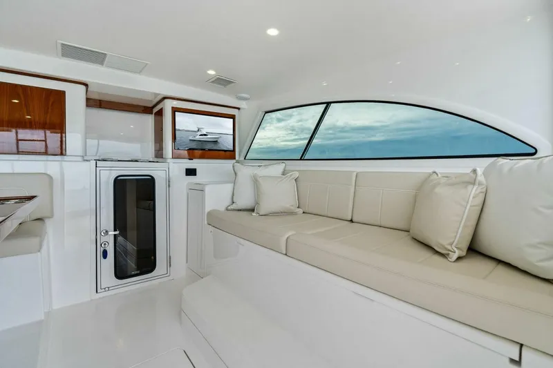 Damfino Yacht Photos Pics Interior of 2021 Viking 46 Billfish yacht with plush seating and modern design.