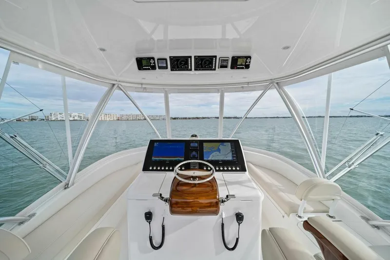 Damfino Yacht Photos Pics 2021 Viking 46 Billfish helm with modern navigation system and panoramic ocean view.