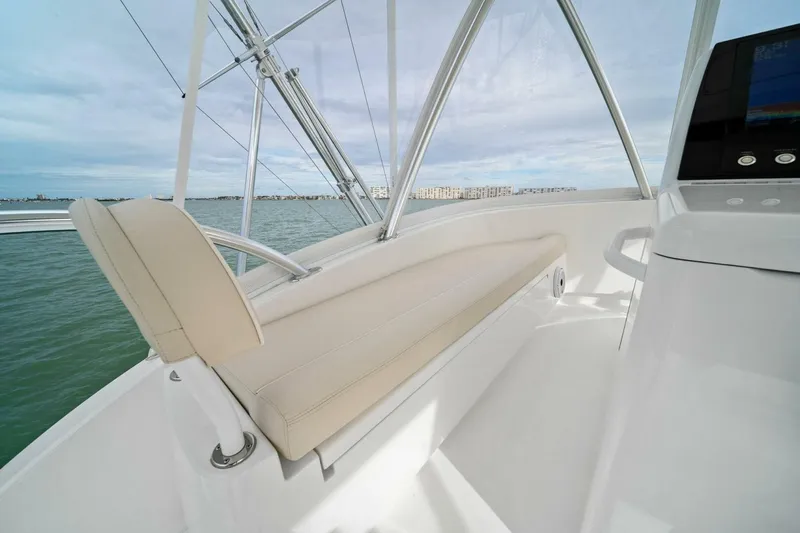 Damfino Yacht Photos Pics 2021 Viking 46 Billfish interior with beige seating and ocean view.