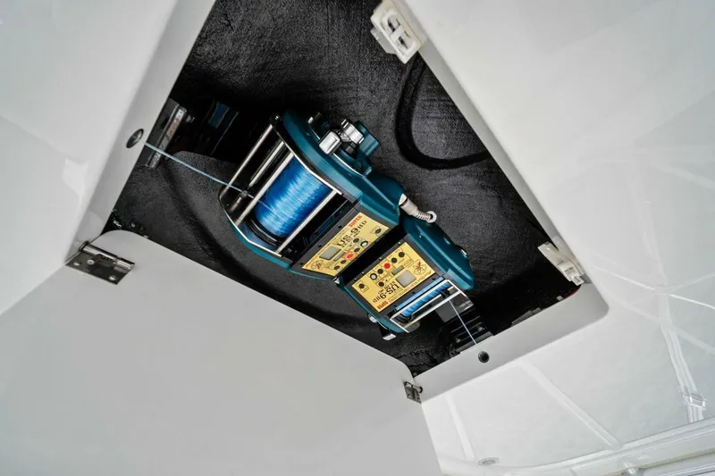 Damfino Yacht Photos Pics 2021 Viking 46 Billfish fishing reel system in a storage compartment.