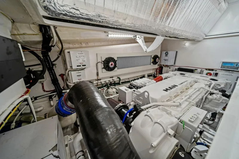 Damfino Yacht Photos Pics Engine room of 2021 Viking 46 Billfish yacht, featuring a MAN engine and advanced equipment.