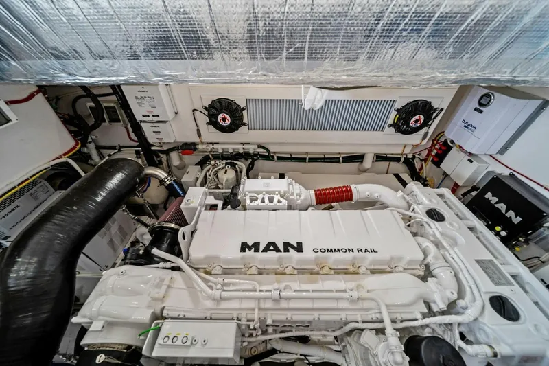 Damfino Yacht Photos Pics Engine room of 2021 Viking 46 Billfish with MAN Common Rail engine.