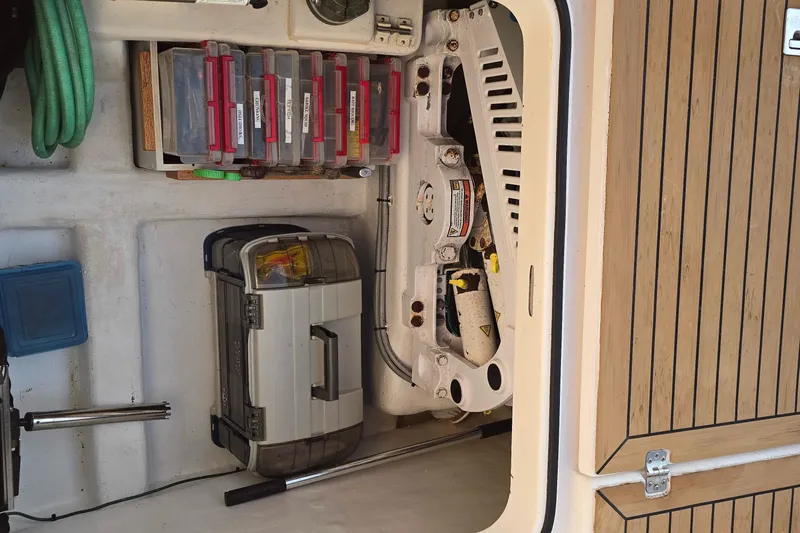 Buenos Aires Yacht Photos Pics Storage compartment of a 2003 Riviera 48 Flybridge with tools and equipment.