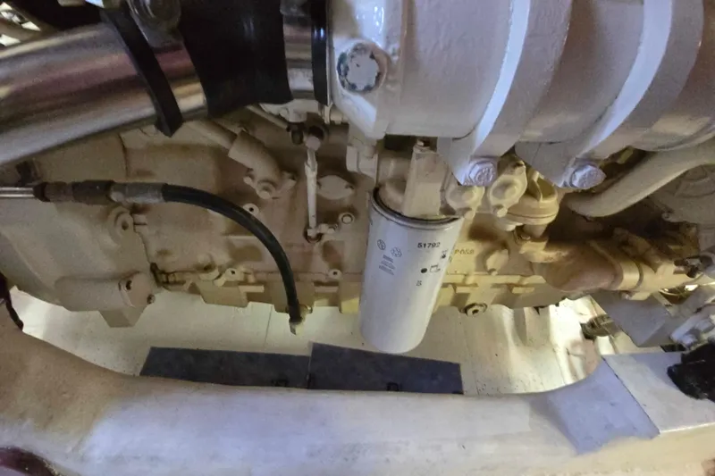 Buenos Aires Yacht Photos Pics Engine compartment of a 2003 Riviera 48 Flybridge yacht, showcasing mechanical components.