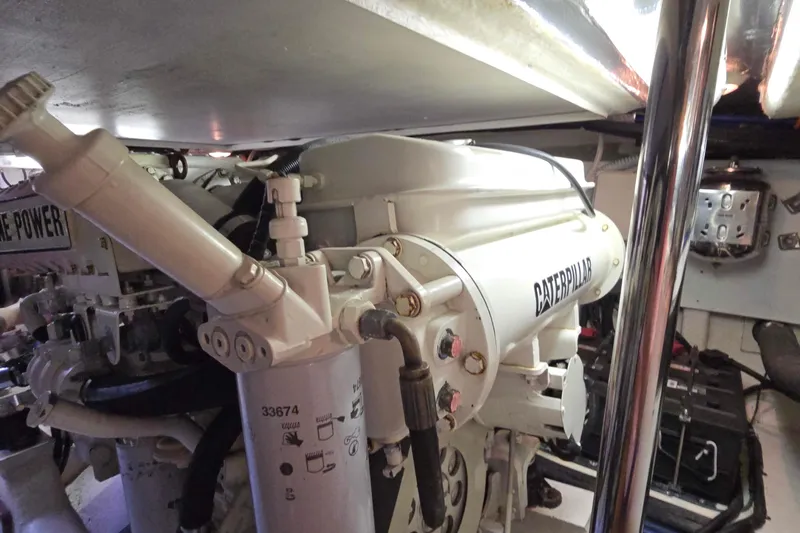 Buenos Aires Yacht Photos Pics Engine room of 2003 Riviera 48 Flybridge with Caterpillar engine components.