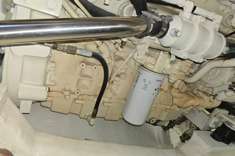 Buenos Aires Yacht Photos Pics Engine compartment of a 2003 Riviera 48 Flybridge yacht, showcasing mechanical components.