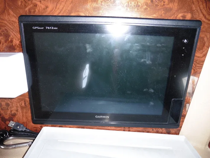  Yacht Photos Pics Garmin GPSmap 7612xsv on 2005 Meridian PILOTHOUSE boat, mounted on wood panel.