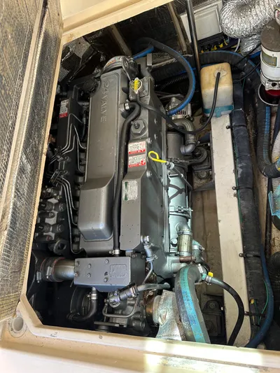  Yacht Photos Pics Engine compartment of a 2006 Albin 28 Tournament Express boat, showcasing detailed machinery.