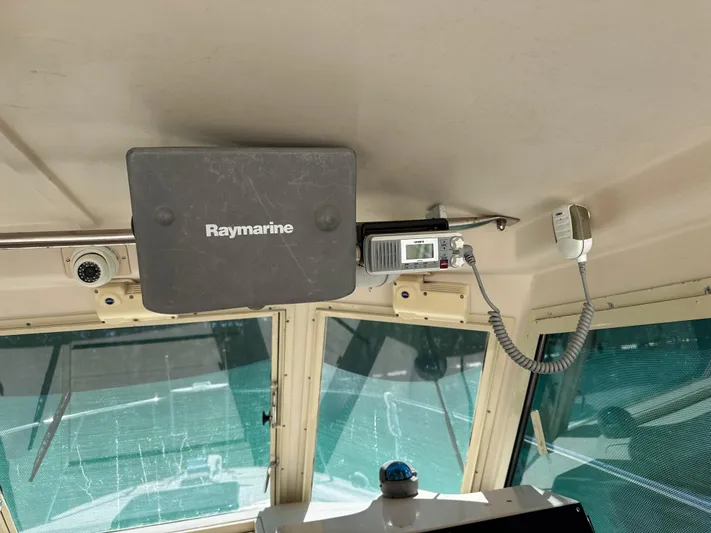  Yacht Photos Pics 2006 Albin 28 Tournament Express cockpit with Raymarine equipment and communication devices.