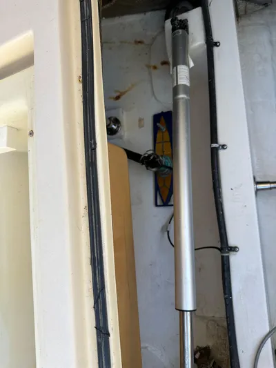  Yacht Photos Pics Interior view of a 2006 Albin 28 Tournament Express boat, showing a metal pole and wiring.