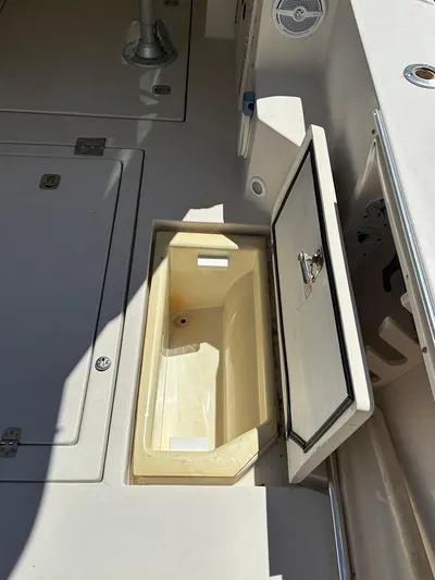  Yacht Photos Pics Open storage compartment on 2006 Albin 28 Tournament Express boat deck.