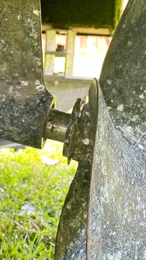  Yacht Photos Pics Close-up of a Beneteau Swift Trawler 34 propeller, 2009 model, with visible wear.