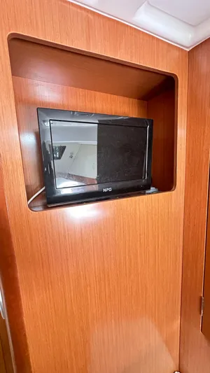  Yacht Photos Pics 2009 Beneteau Swift Trawler 34 interior with built-in TV.