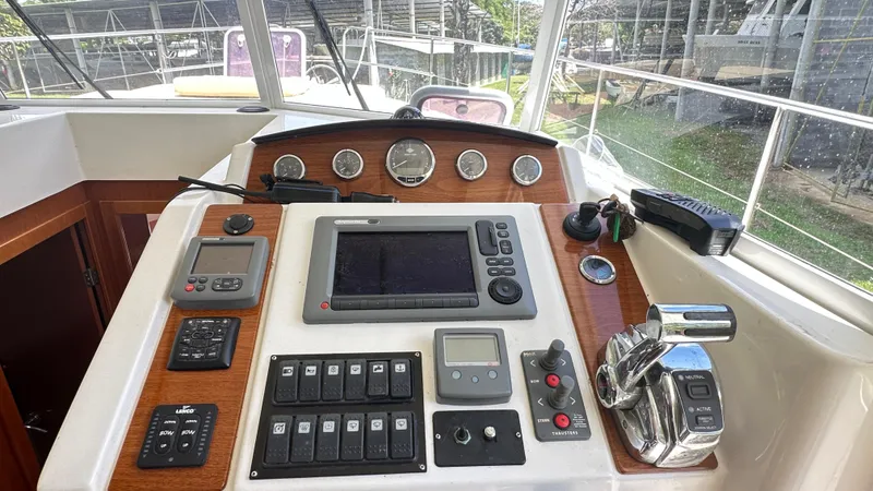  Yacht Photos Pics Helm of 2009 Beneteau Swift Trawler 34 with navigation controls and instruments.