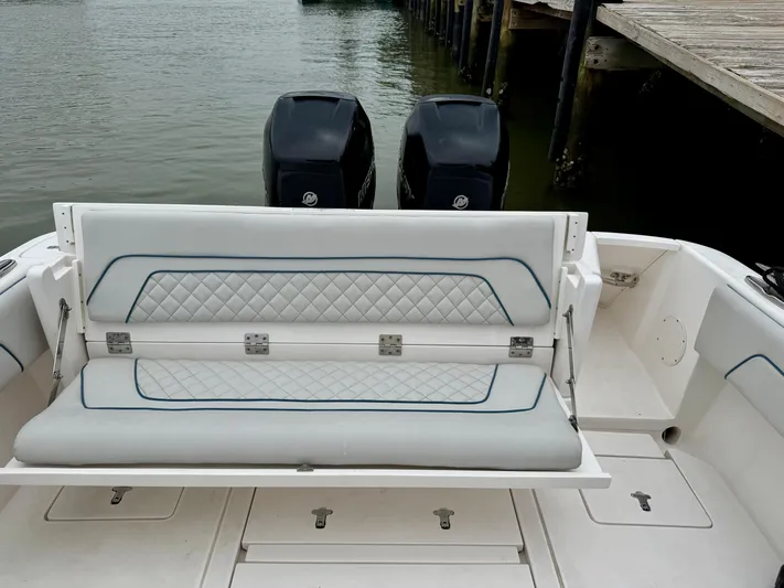  Yacht Photos Pics 2018 Intrepid 327 Center Console boat with dual engines and cushioned seating.