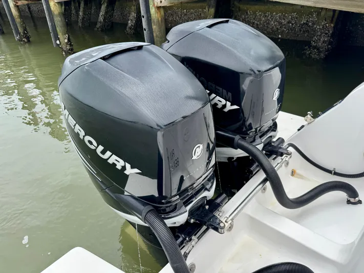  Yacht Photos Pics Twin Mercury outboard engines on a 2018 Intrepid 327 Center Console boat.