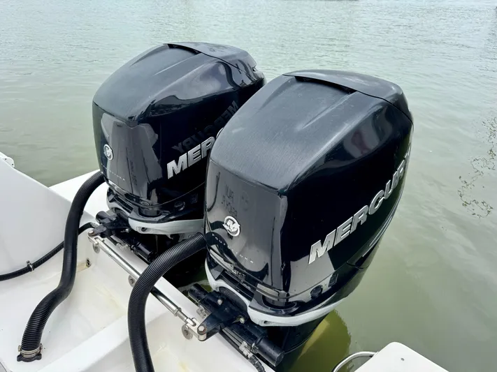  Yacht Photos Pics Twin Mercury outboard engines on a 2018 Intrepid 327 Center Console boat.
