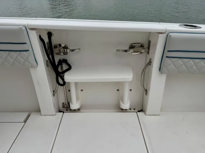  Yacht Photos Pics 2018 Intrepid 327 Center Console boat interior with seating and storage features.