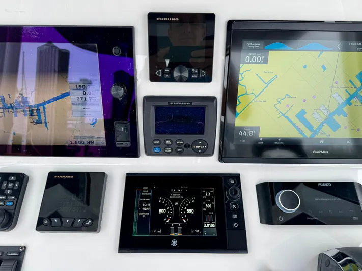  Yacht Photos Pics 2018 Intrepid 327 Center Console dashboard with advanced navigation and control systems.