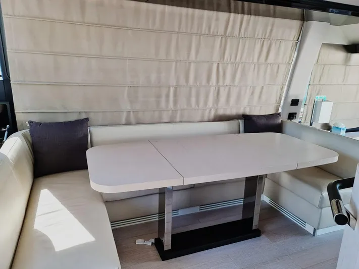 Mi Bluu Yacht Photos Pics Luxurious interior seating area on a 2019 Azimut Flybridge 66 yacht.
