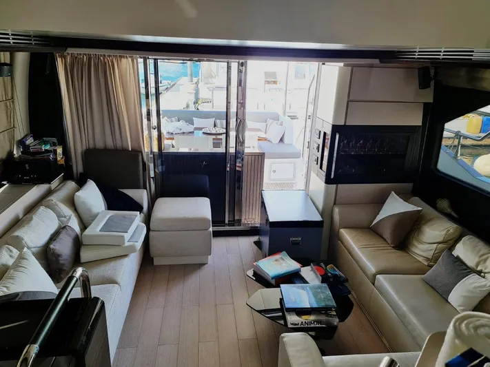 Mi Bluu Yacht Photos Pics Luxurious interior of 2019 Azimut Flybridge 66 yacht with elegant seating and modern decor.