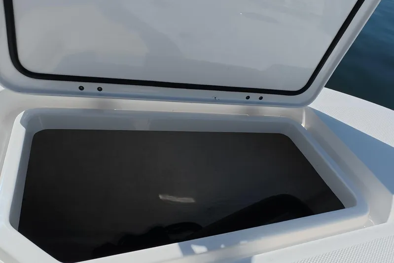  Yacht Photos Pics Open storage compartment on 2023 Invincible 33 Catamaran boat.