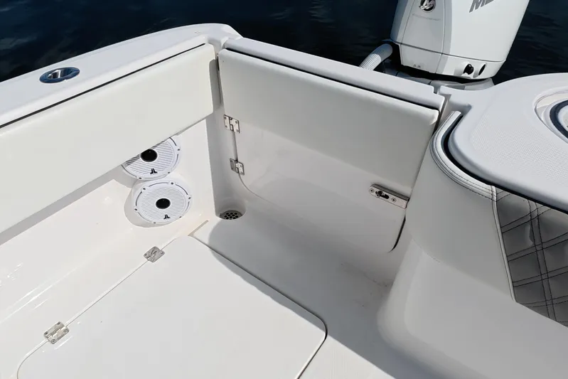  Yacht Photos Pics 2023 Invincible 33 Catamaran interior detail with speakers and seating.