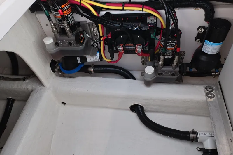 Yacht Photos Pics Electrical and plumbing systems inside a 2023 Invincible 33 Catamaran boat.