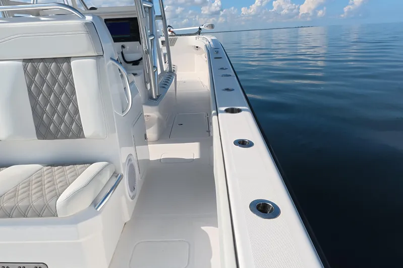  Yacht Photos Pics 2023 Invincible 33 Catamaran interior with luxurious seating and ocean view.