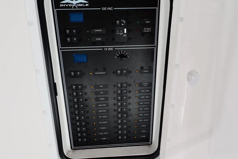  Yacht Photos Pics Electrical control panel of 2023 Invincible 33 Catamaran, featuring 120 VAC and 12 VDC systems.